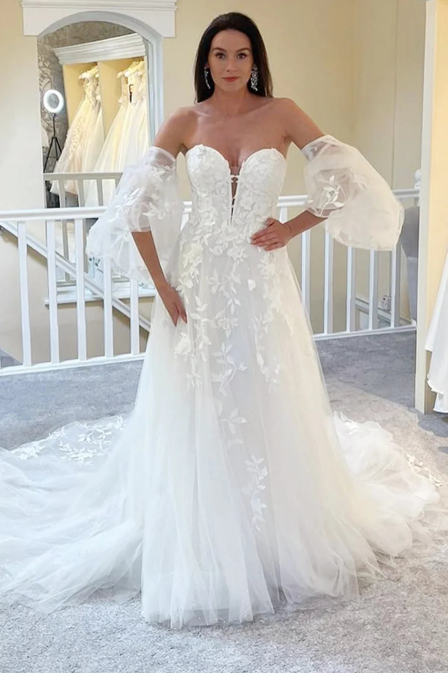 Robe de mariée longue bustier trapèze avec manches